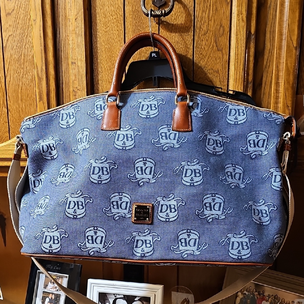 Dooney & Bourke Blue Duffel Bag with Brown Handles